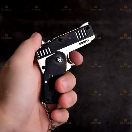 Брелок для ключей «Пистолет складной» (шестизарядный).  Keychain for keys "Folding pistol"